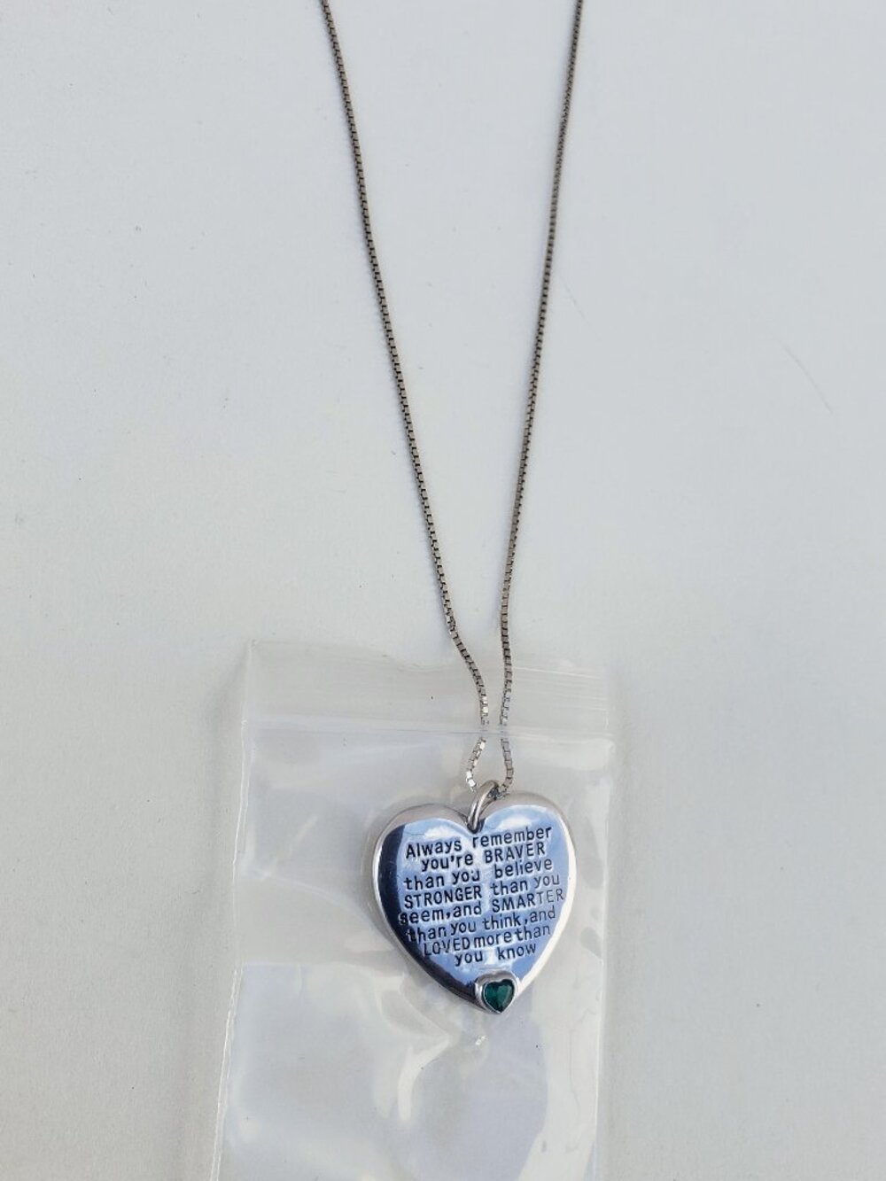 YFN Jewelers heart pendant with green stone and sweet engraving